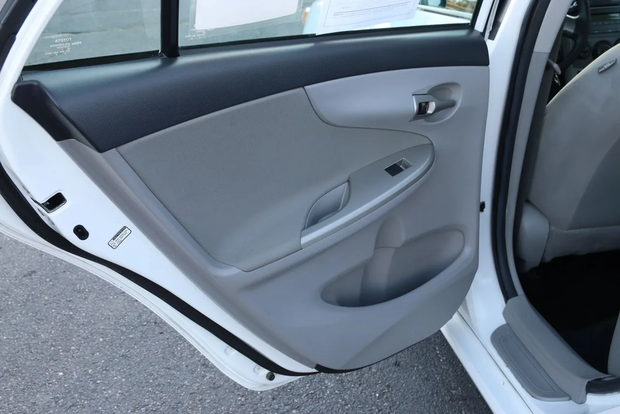 2011 Toyota Corolla LE Sedan 4D in white — photo 16 of 40