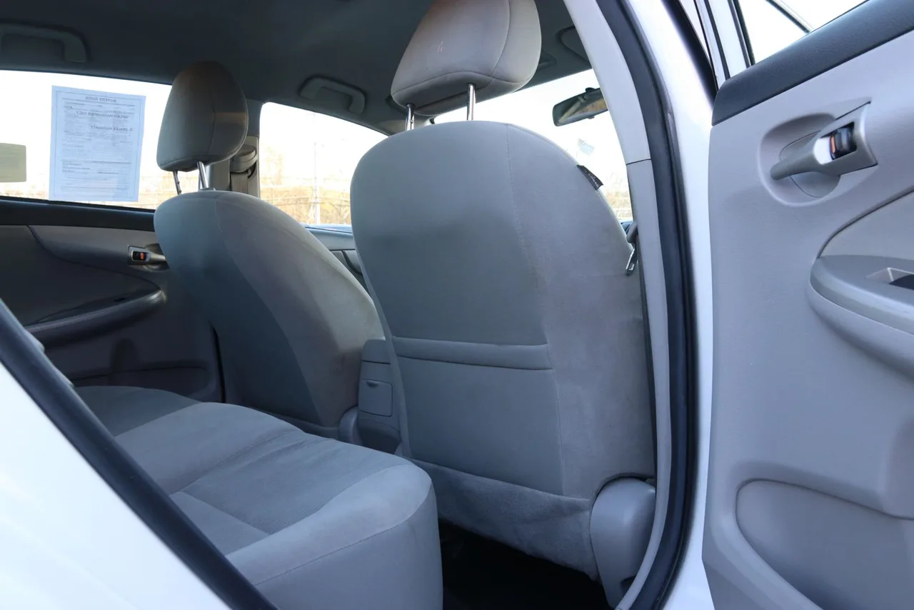 2011 Toyota Corolla LE Sedan 4D in white — photo 20 of 40