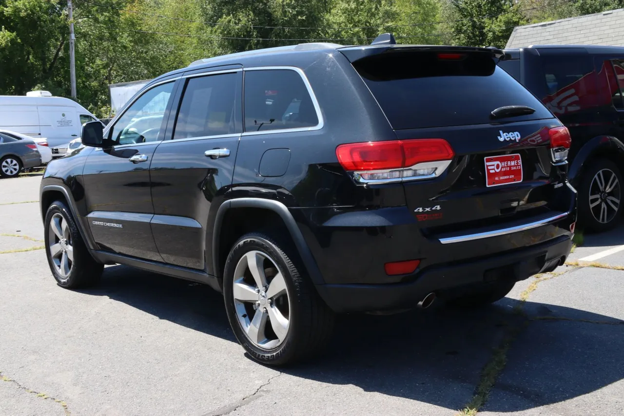 2014 Jeep Grand Cherokee Limited Sport Utility 4D in black — photo 5 of 31