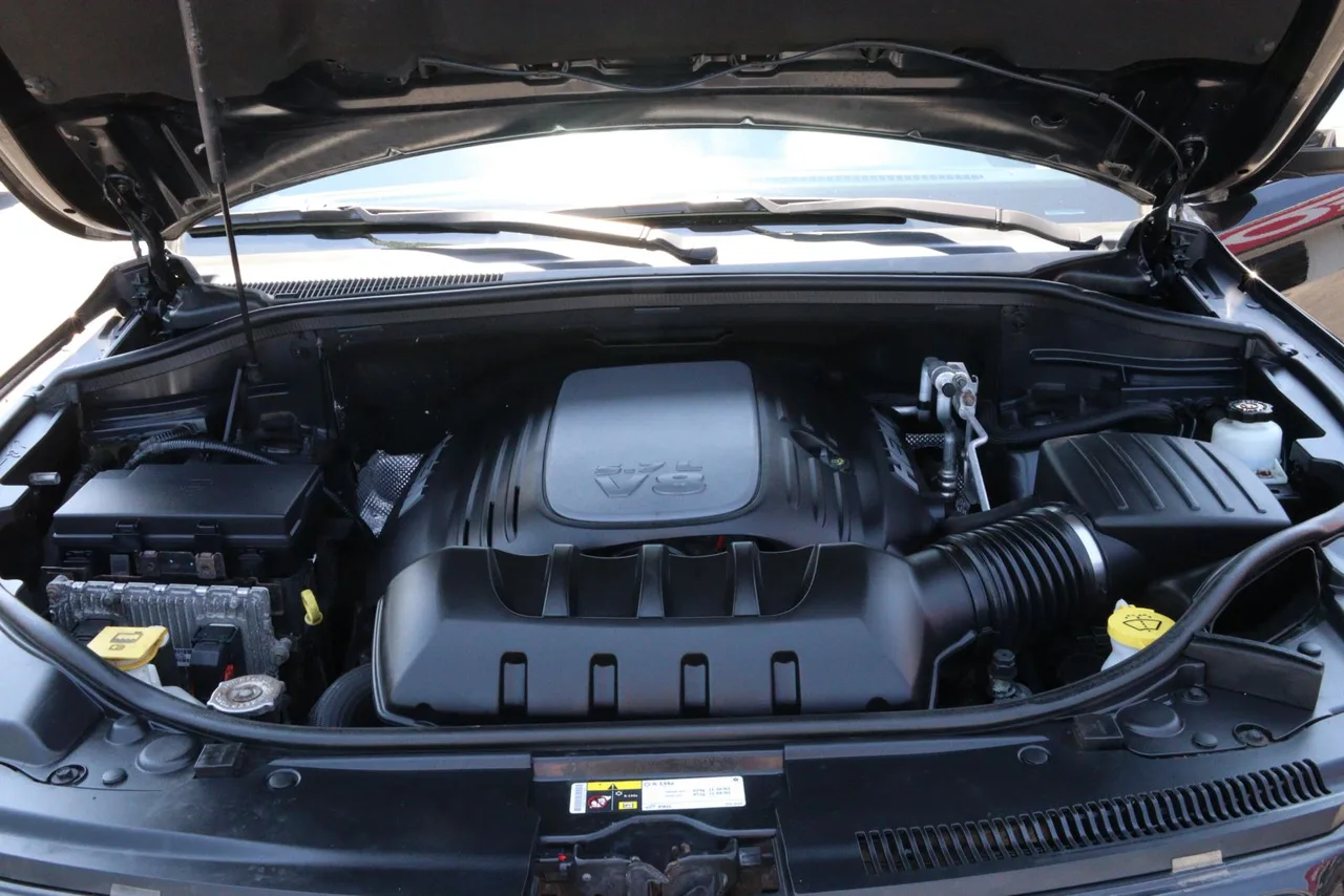 2014 Jeep Grand Cherokee Limited Sport Utility 4D in black — photo 11 of 31
