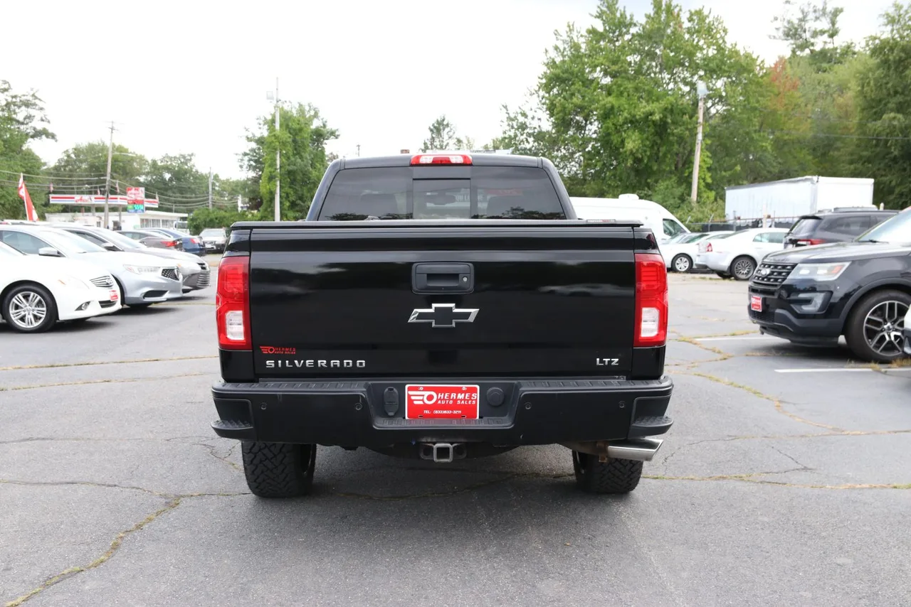 2017 Chevrolet Silverado 1500 Double Cab Z71 LTZ Pickup 4D 6 1/2 ft in black — photo 7 of 35