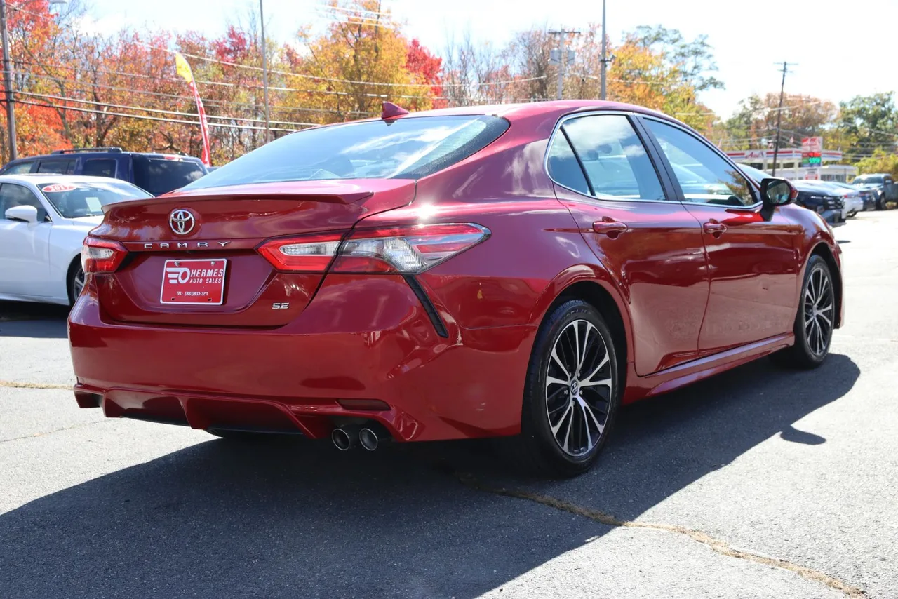 2019 Toyota Camry SE Sedan 4D in red — photo 8 of 37