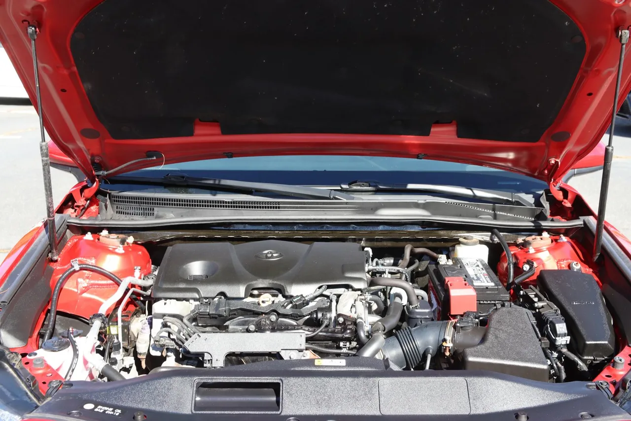 2019 Toyota Camry SE Sedan 4D in red — photo 10 of 37