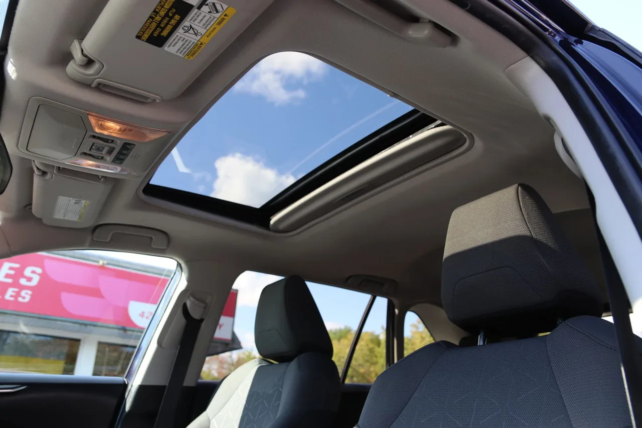 2020 Toyota RAV4 XLE Sport Utility 4D in blue — photo 17 of 39