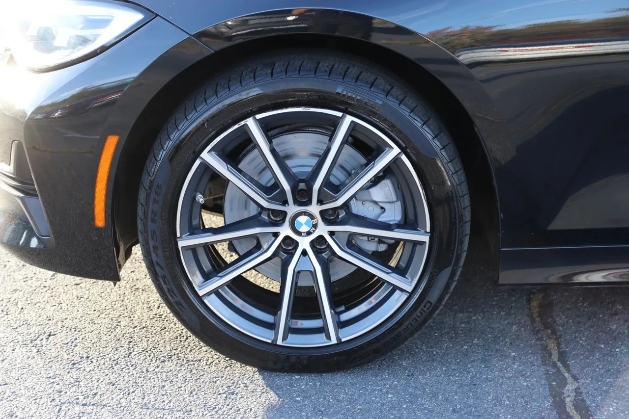 2021 BMW 3 Series 330i xDrive Sedan 4D in black — photo 4 of 43