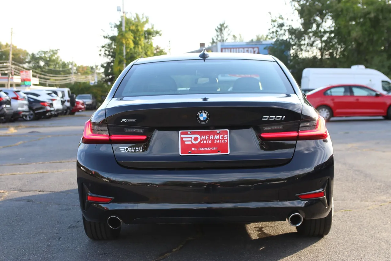 2021 BMW 3 Series 330i xDrive Sedan 4D in black — photo 7 of 43