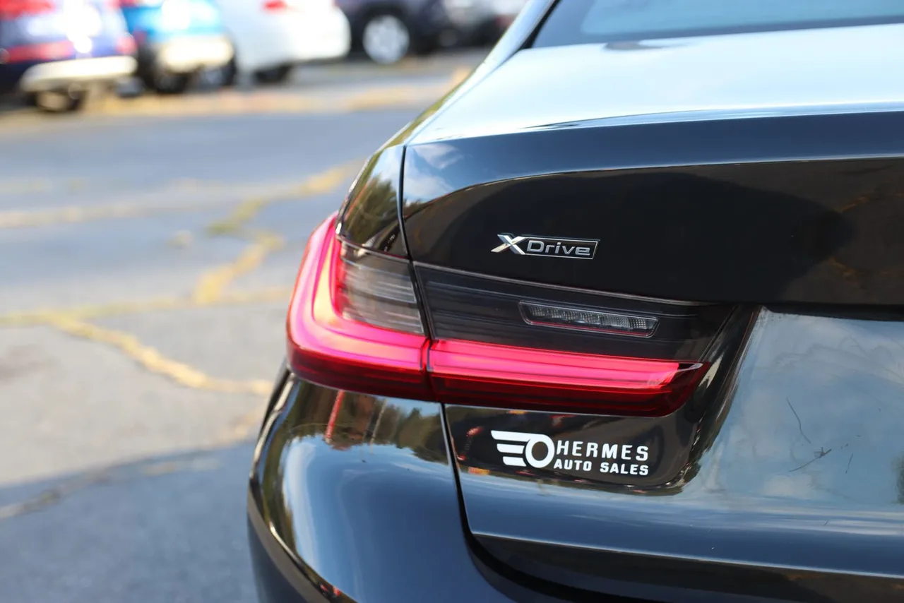 2021 BMW 3 Series 330i xDrive Sedan 4D in black — photo 8 of 43