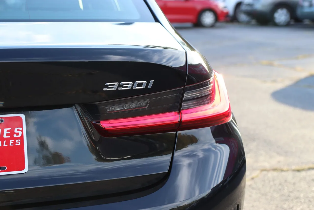 2021 BMW 3 Series 330i xDrive Sedan 4D in black — photo 9 of 43