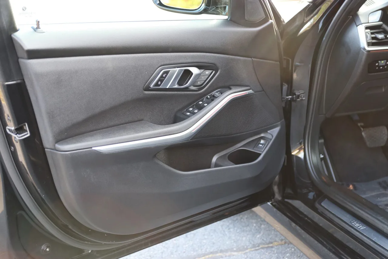 2021 BMW 3 Series 330i xDrive Sedan 4D in black — photo 12 of 43