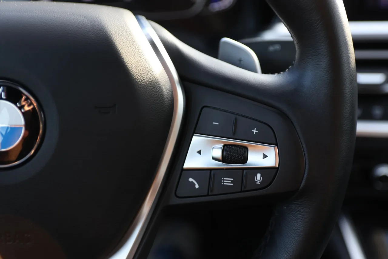 2021 BMW 3 Series 330i xDrive Sedan 4D in black — photo 41 of 43