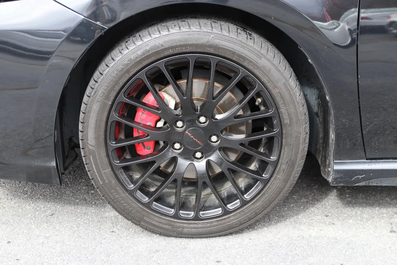 2022 Toyota Camry SE Sedan 4D in black — photo 4 of 39